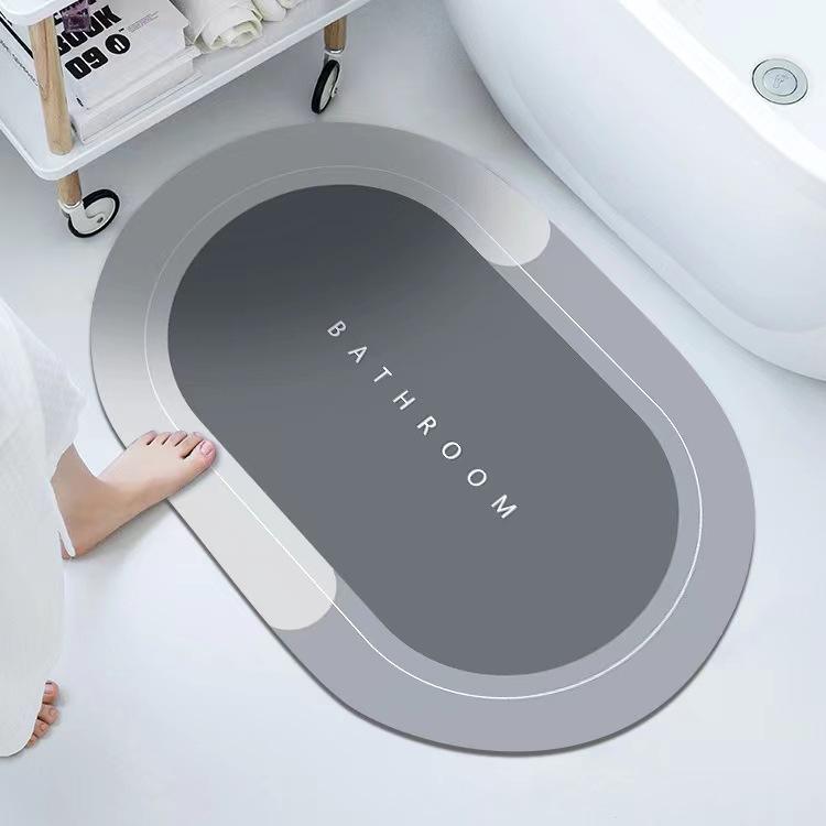 AquaMat™ : Tapis de douche adhésif ultra absorbant & anti-dérapant — Garde ton sol sec et ta famille en sécurité